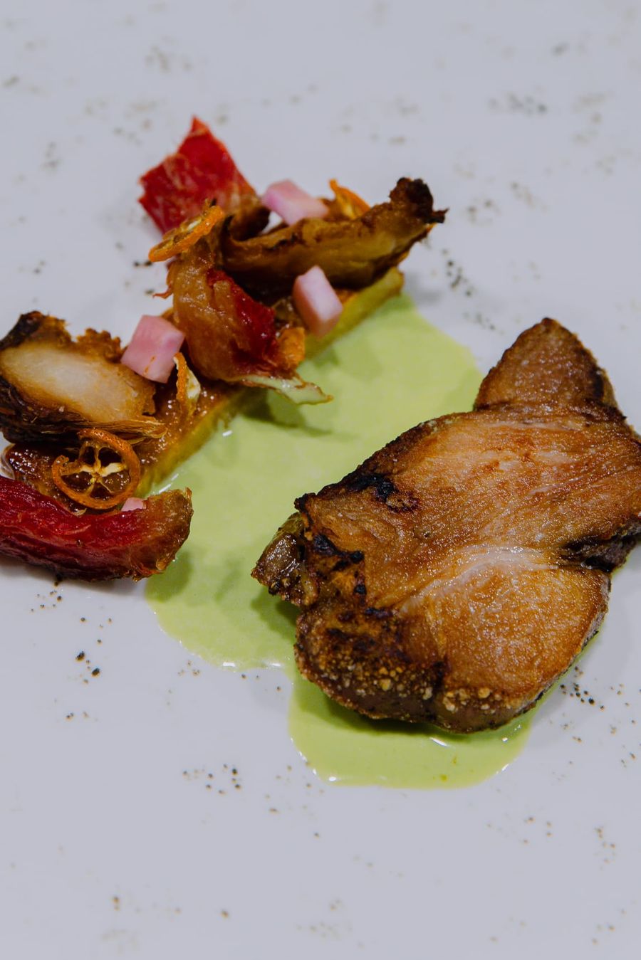 Pork belly with pea purée